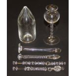 An early 19th Century glass Bitters dispenser of cylindrical form with pointed top cut with flutes,