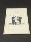 A framed and glazed image of the Royal Family adapted from the 1971 Christmas card signed (probably