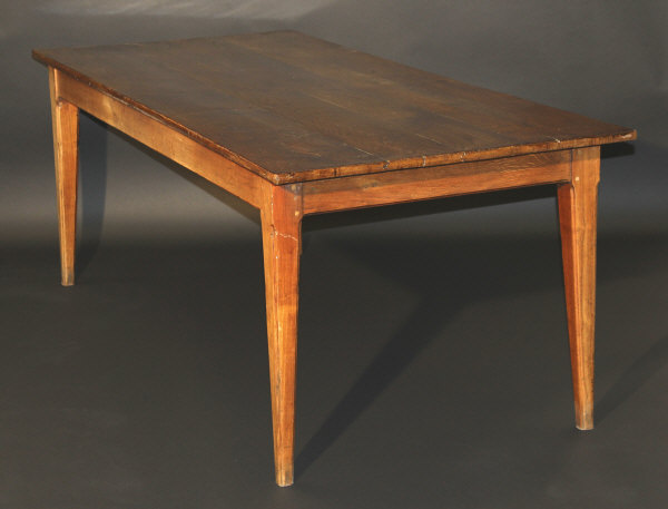 A 19th Century French oak and fruitwood farmhouse kitchen table,