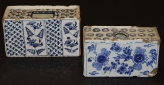 An 18th Century Delft flower brick decorated in blue and white with panels of flowers alternating