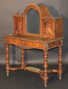 A Victorian burr walnut bonheur du jour, the mirrored and carved superstructure with birds eye maple