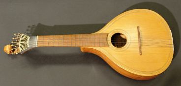 A Portuguese guitar by Joao Miguel Andrade of Lisbon, bears label to interior, 66.