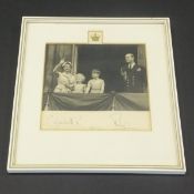 A framed and glazed black and white image of Her Majesty The Queen and Prince Philip with Prince