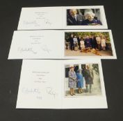 A Christmas card from Her Majesty The Queen and Prince Philip depicting twelve members of the Royal