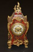 A late 19th Century boulle work decorated mantel clock in the Rococo taste of Louis XV with all-over