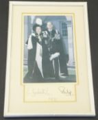 A framed and glazed image of Her Majesty The Queen and Prince Philip in Garter Robes adapted from