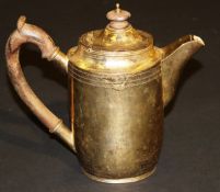 A Guild of Handicrafts beaten silver gilt water jug with wooden handle (London 2001), 20.5 cm