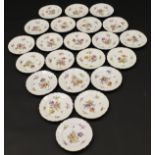 A collection of 22 20th Century Berlin porcelain plates painted with floral spray decoration and