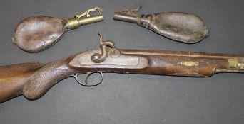 A 19th Century hammer action rifle with oak stock (with alterations), 111 cm long overall,