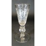 A mid 18th Century Low Countries wine glass with trumpet shaped bowl engraved with eight birds and