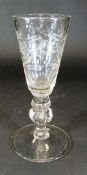 A mid 18th Century Low Countries wine glass with trumpet shaped bowl engraved with eight birds and