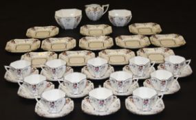 A Shelley "Queen Anne" pattern tea service for twelve place settings, each decorated with peaches