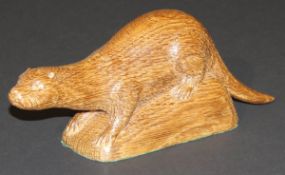 A mid 20th Century Robert Thompson "The Mouseman" of Kilburn carved oak figure of an otter with