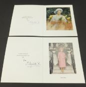 A Christmas card from HRH Elizabeth The Queen Mother depicting the Queen Mother amongst flowers