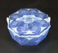 A Dutch Delft butter dish and cover decorated in underglaze blue with lotus flowers in the Persian