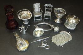 A collection of miniature silver and other items to include two miniature Dutch silver chairs,