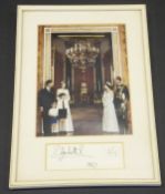 A framed and glazed image of the Royal Family in formal dress adapted from the 1967 Christmas card