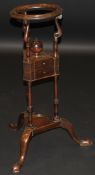 A George III mahogany circular washstand,