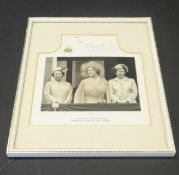 A framed and glazed image of Queen Mother with Her Majesty The Queen and Princess Margaret at