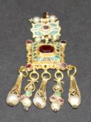 A 19th Century gold pendant set with seed pearls, emeralds and rubies (possibly Liberian), approx 5.