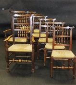 A composite set of eight North Country beech and elm spindle back rush seat dining chairs in the