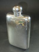 A late Victorian hip flask of large proportions (by W & G Neal, London, 1900), 18 cm long, approx 7.