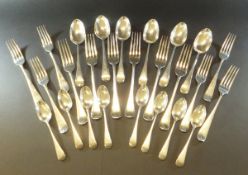 A collection of Old English pattern cutlery comprising six silver table forks, six dessert forks,