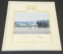 A framed and glazed image of Her Majesty The Queen and Prince Philip with Princes Andrew and Edward