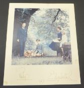An unframed colour image of Her Majesty The Queen and Prince Philip with Prince Charles,