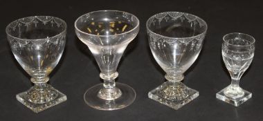 Two circa 1800 rummers, the ogee/ovoid shaped bowls to collared stem, domed foot and square