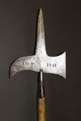 A 19th Century steel halberd, the blade engraved to one side "TP 1813" and to the other "JWP 1841",