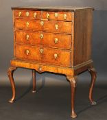 An early 18th Century walnut and cross-banded chest,