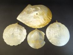 A collection of three Grand Tour carved mother of pearl religious mementos including "S.