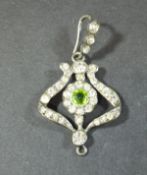 An Art Nouveau style white stone and green stone set pendant