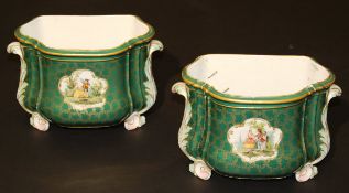 A pair of early 20th Century Meissen cachepots of shaped D form and with scrolling acanthus handles