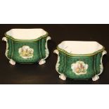 A pair of early 20th Century Meissen cachepots of shaped D form and with scrolling acanthus handles