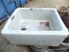 A Belfast sink and a selection of composite stone garden planters