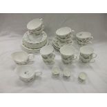 A collection of Susie Cooper "Strawberry" pattern tea wares to include two jugs, various plates,