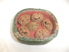 Six Chinese carved betel nuts depicting various figures, animals, etc. (cased) CONDITION REPORTS