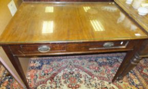 A Victorian mahogany rectangular side table with two drawers to the frieze and brass handles,