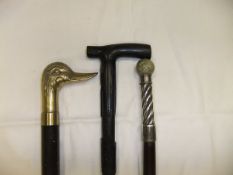 A silver mounted walking cane,