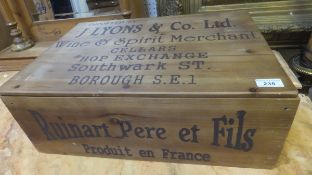 A reproduction wine crate inscribed "J Lyons & Co.