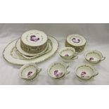 A Royal Worcester "The Chamberlain" part tea set with puce printed decoration and scrolling