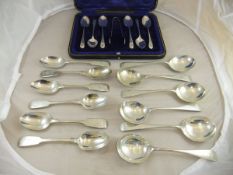 A cased set of six Edwardian silver bright cut teaspoons and sugar tongs,