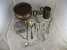 A collection of foreign white metal and other cutlery to include straining spoon, pusher,