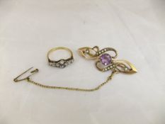 An 18 carat gold diamond set dress ring, and a 9 carat gold amethyst and seed pearl set bar brooch