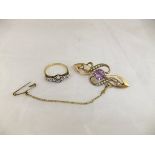 An 18 carat gold diamond set dress ring, and a 9 carat gold amethyst and seed pearl set bar brooch