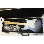 A Fender American Standard Stratocaster electric guitar, charcoal frost metallic, maple neck, Serial