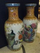 Two modern Oriental porcelain floor vases polychrome decorated with birds amongst blossom