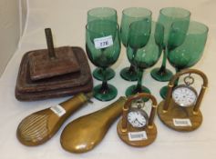 A set of six Bristol green stemmed wine glasses, two brass and copper shot flasks,